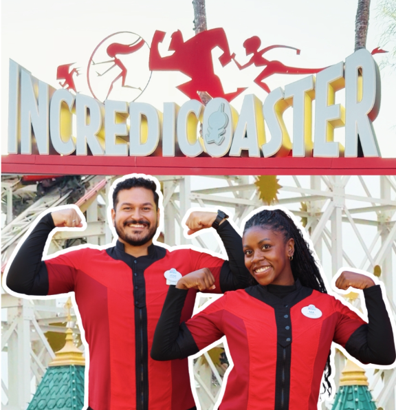 Two Cast Members holding up strong arms in a flexing pose
