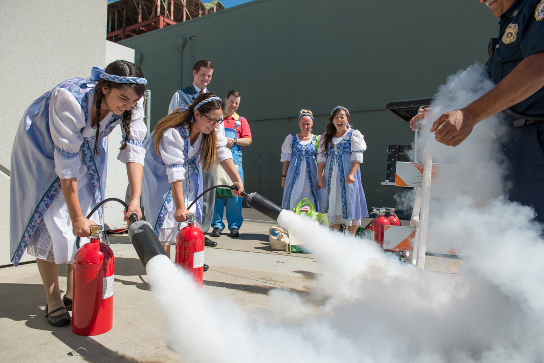 Fairy Godmother’s Apprentices from Bibbidi Bobbidi Boutique participated in a fire extinguisher training with the Disneyland Fire Department. 