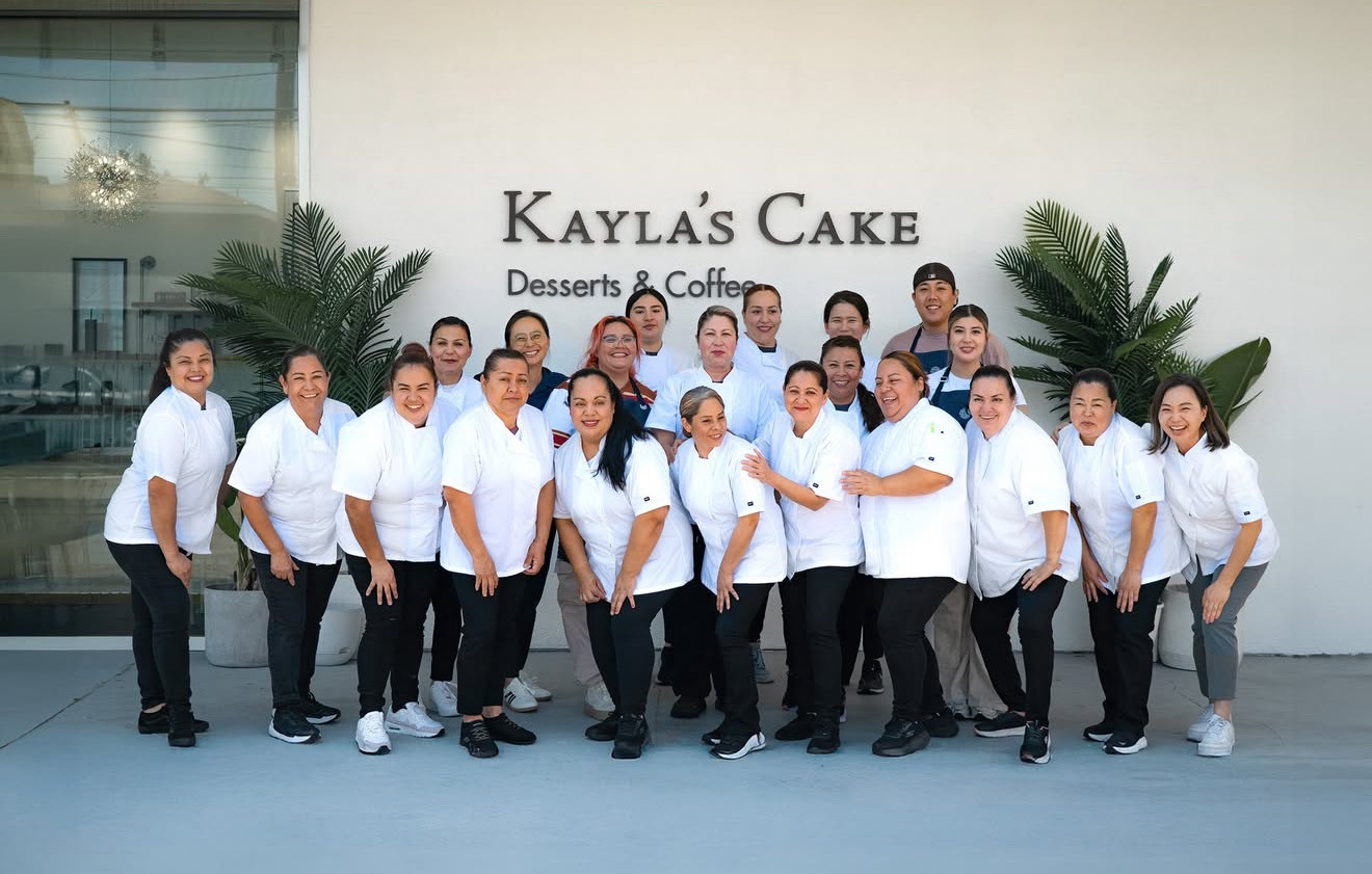 The team behind Kayla's Cake smile outside of their shop in Fullerton, California.